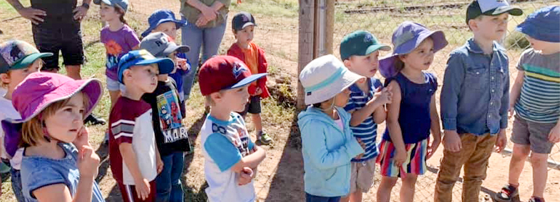 CEC Early Learning Academy students standing during a field trip