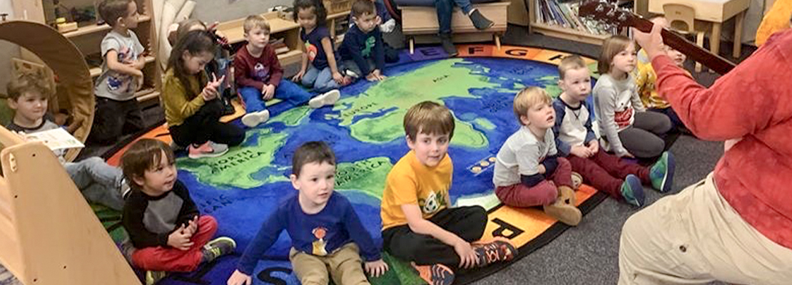 CEC Early Learning Academy students sitting in a classroom
